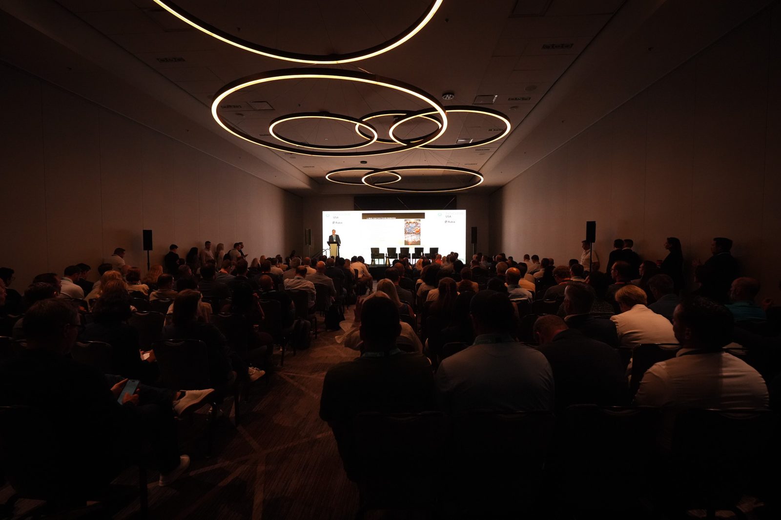 Main stage at Datacloud USA 2026 in the Austin Marriott Downtown ballroom, full house under ring lights